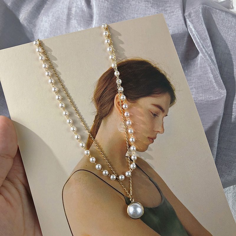 Elegant Geometric Pearl Necklace